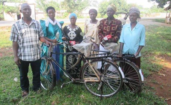 rural women with bicycles